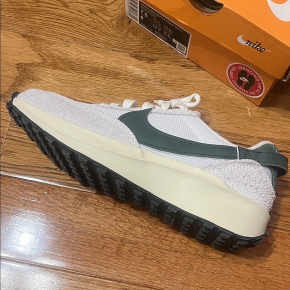 Nike Shoes - New…Never been worn. Nike Cream and Dark Green Sneakers